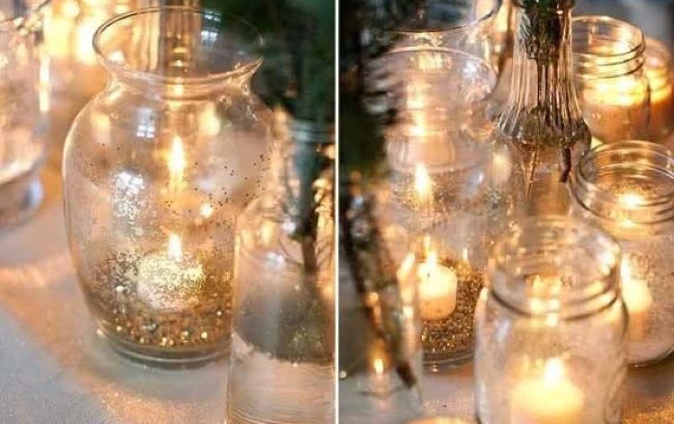 Potes de vidro com velas dentro